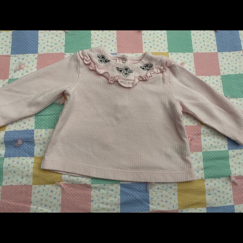 Pink and black sweater